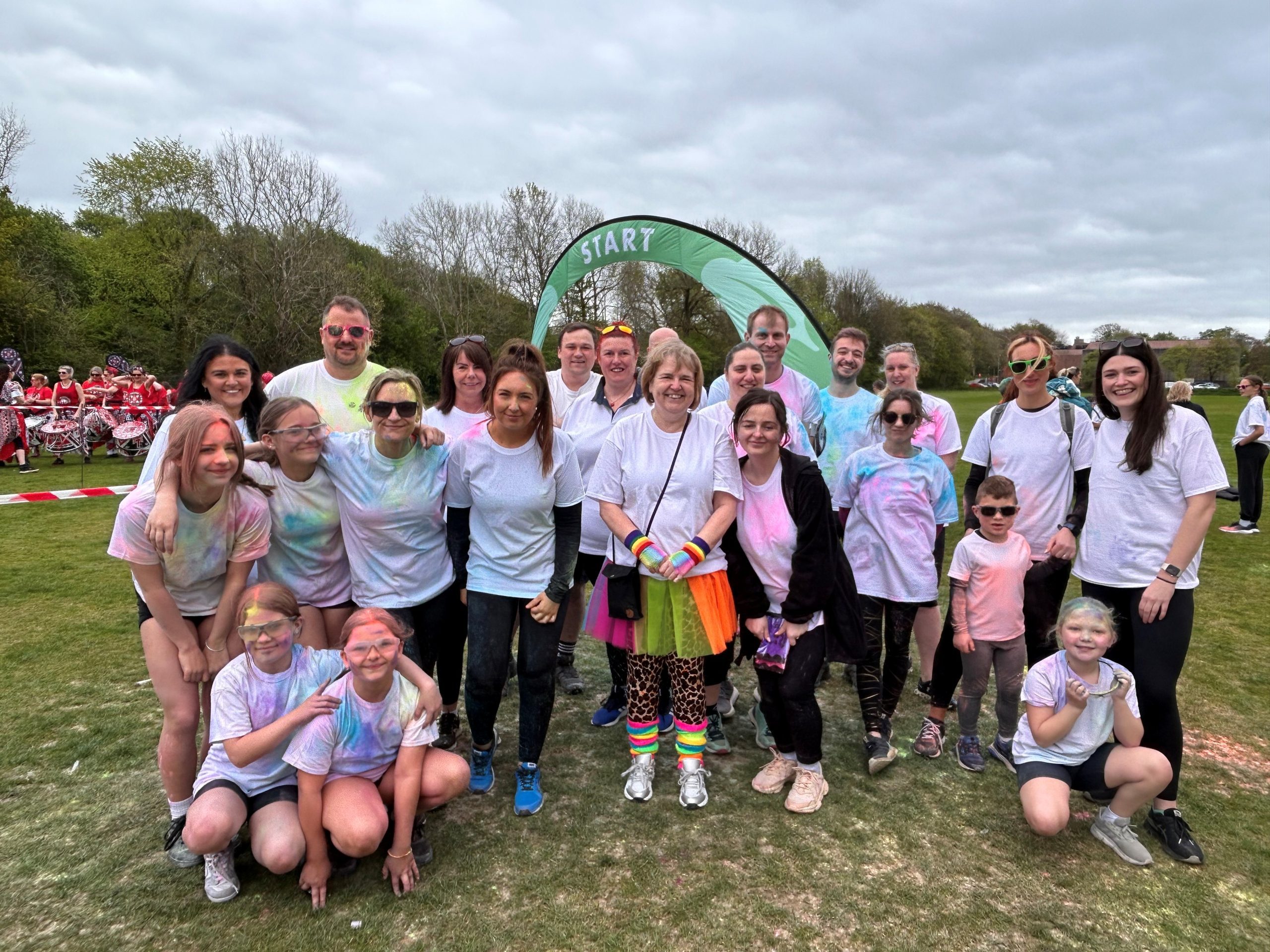 South Lakes Housing colleagues cross finish line at Kendal Colour Dash 2025